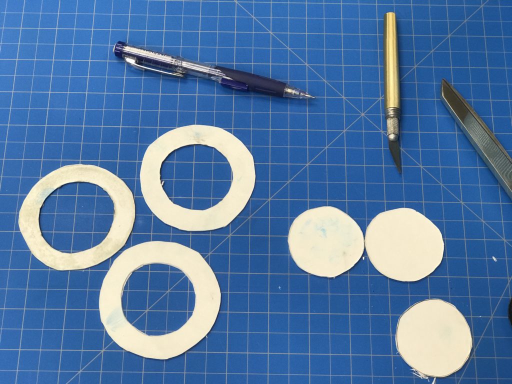 I've cut three washers out of heavy cardstock.