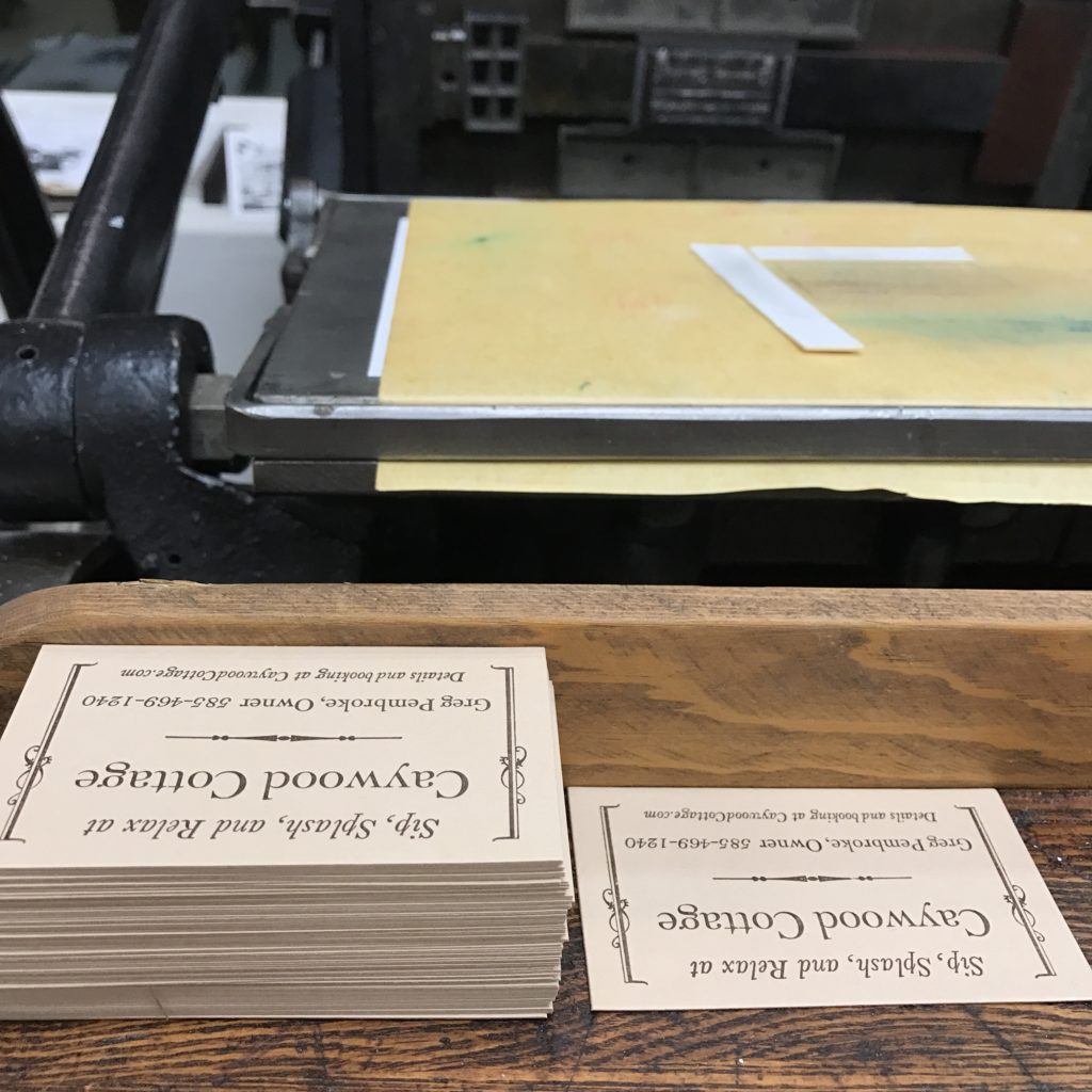Stack of finished cards next to a single card for perpetual comparison