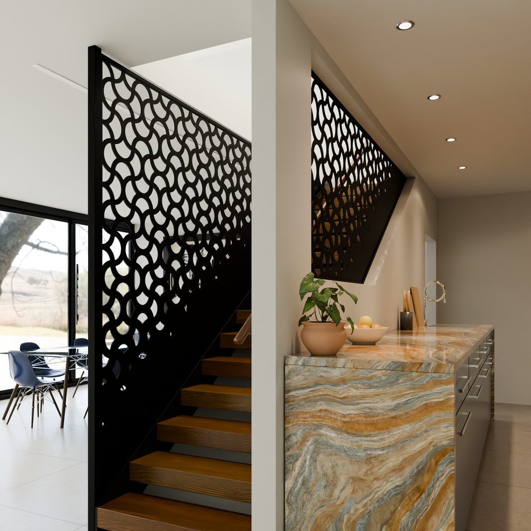The screen guards the stair and lets the kitchen keep its daylight.